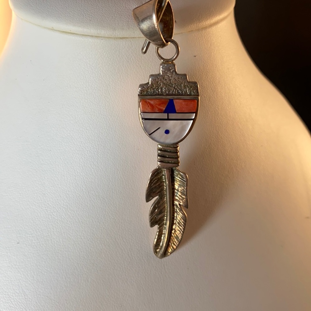 Zuni sun god/ feather pendant